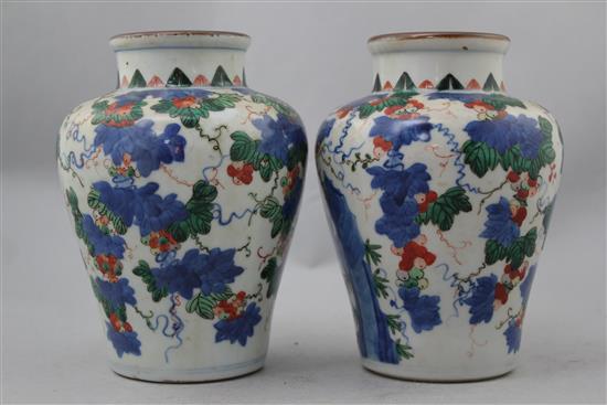Two wucai jars, a Jizhou paper-cut bowl and a blue and white jar and cover, Song to late Qing dynasty,
